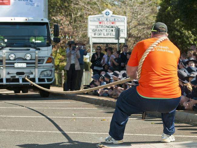 Strongman Grant Edwards pulls a truck.