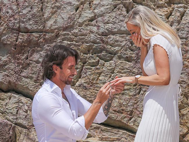 Two time Bachelor contestant Michael Turnbulls surprise proposal to his Gold Coast beauty Queen partner Charlotte Cush as they announce they are having a baby.Picture: Glenn Campbell