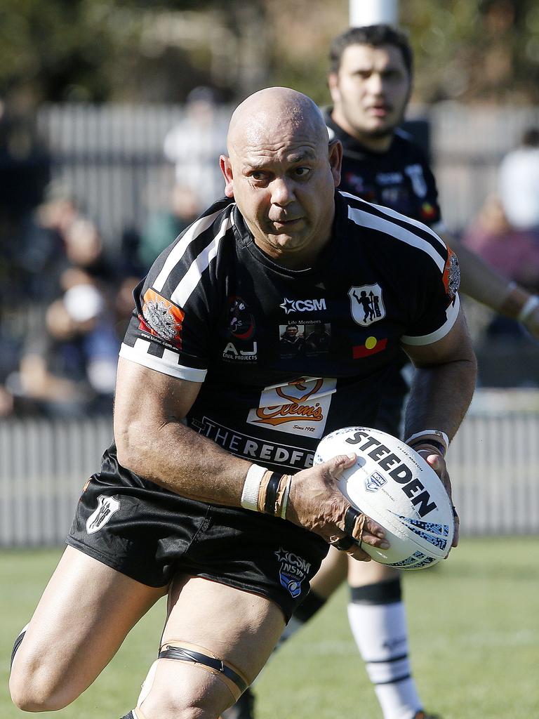 Redfern's Christopher Carr with the ball Picture: John Appleyard