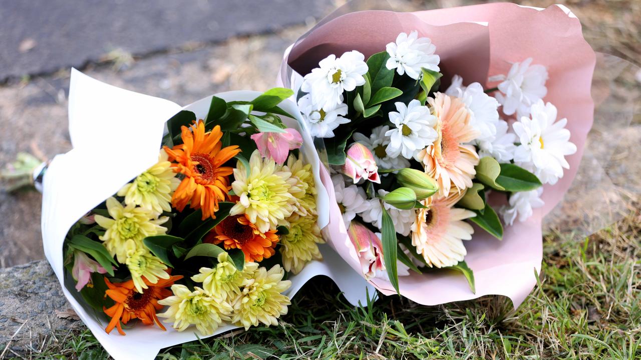 Flowers were left outside the home on Monday. Picture: NewsWire / Damian Shaw