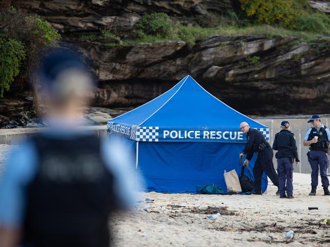 A crime scene at Bronte Beach where a body washed up on the beach this morning.