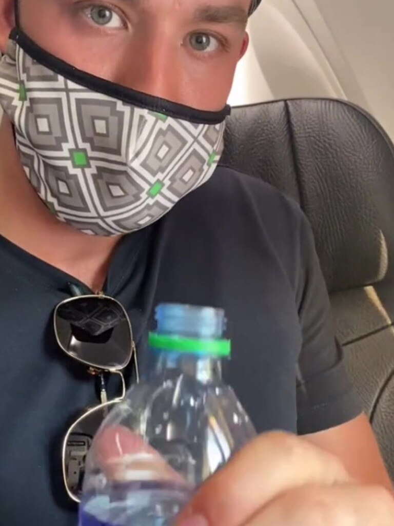He then shows off a water bottle, revealing what he plans to do