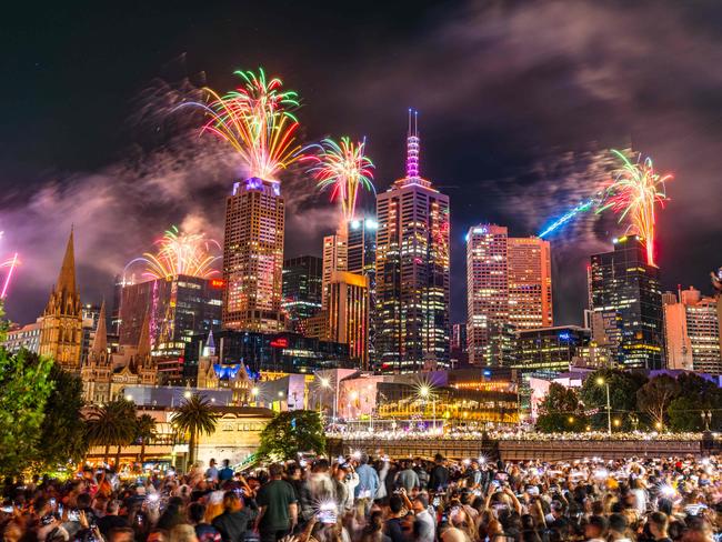 The city skyline was lit up at midnight. Picture: Jason Edwards