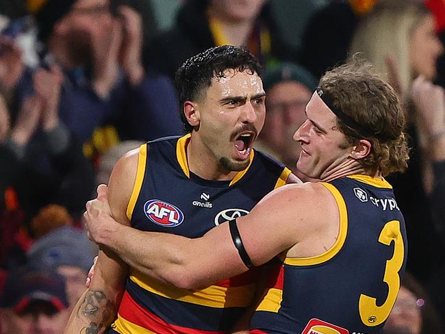ADELAIDE, AUSTRALIA - JUNE 29: Izak Rankine of the Crows celebrates a goal wth Sam Berry during the 2024 AFL Round 16 match between the Adelaide Crows and the GWS GIANTS at Adelaide Oval on June 29, 2024 in Adelaide, Australia. (Photo by Sarah Reed/AFL Photos via Getty Images)