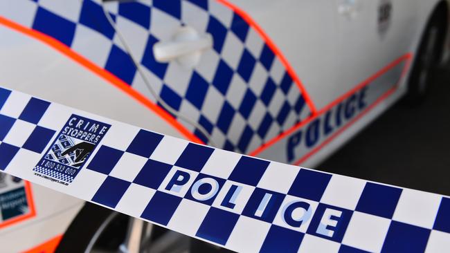 Police say a man a man approached a man and a woman who were sitting in a parked vehicle at Harbour Town shopping centre before producing a knife and demanding property at about 11.20pm.