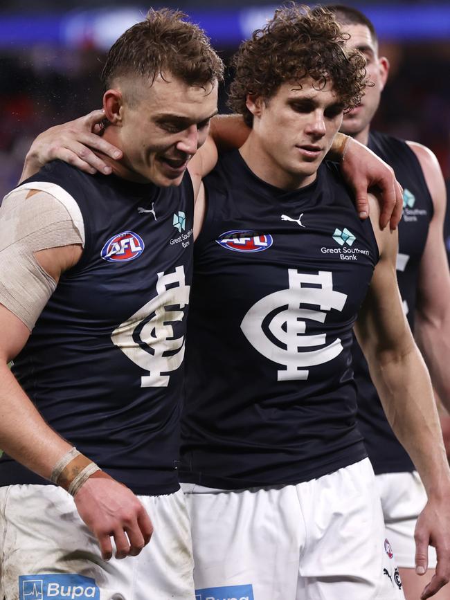 Patrick Cripps and Charlie Curnow walk off Marvel Stadium. Picture: Darrian Traynor/AFL Photos/via Getty Images