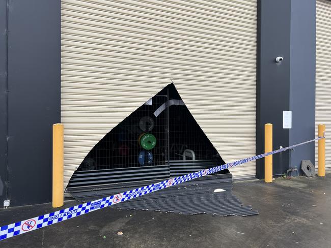 Fire crews cut a hole through the building’s back door to gain access. Picture: Supplied