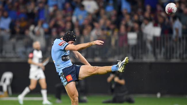 Matt Burton gets plenty of power behind his kicks. Picture: NRL Photos