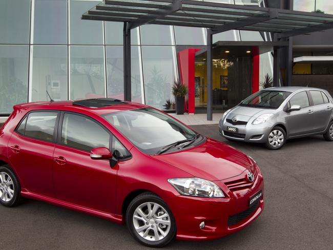 2010 Toyota Corolla (L) and Toyota Yaris hatchbacks.