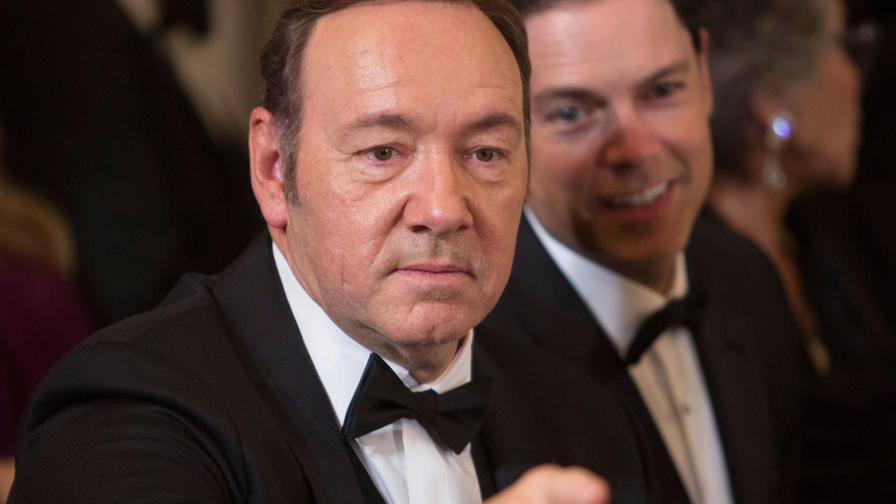 Kevin Spacey appeared in pictures at Buckingham Palace alongside Ghislaine Maxwell, taken in 2002. Picture: Chris Kleponis/AFP