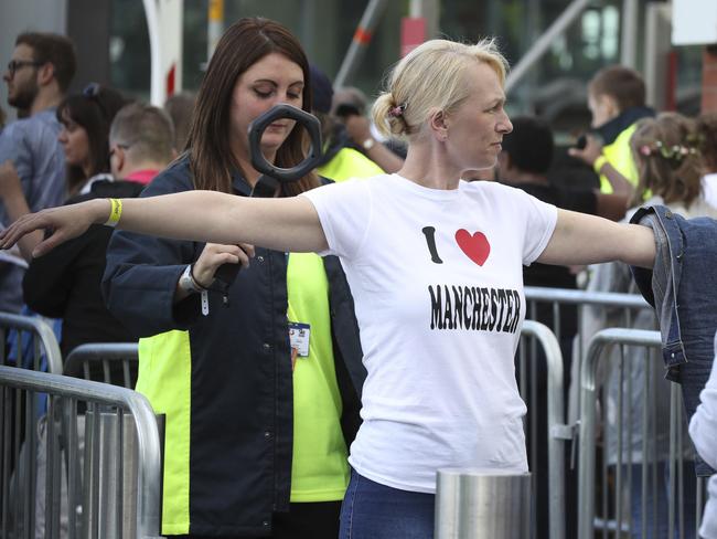 Security staff check people arriving for the One Love Manchester benefit concert Sunday June 4, 2017, for the victims of last month’s Manchester Arena terror attack at the Emirates Old Trafford, Manchester, England. Picture: Owen Humphreys/PA via AP