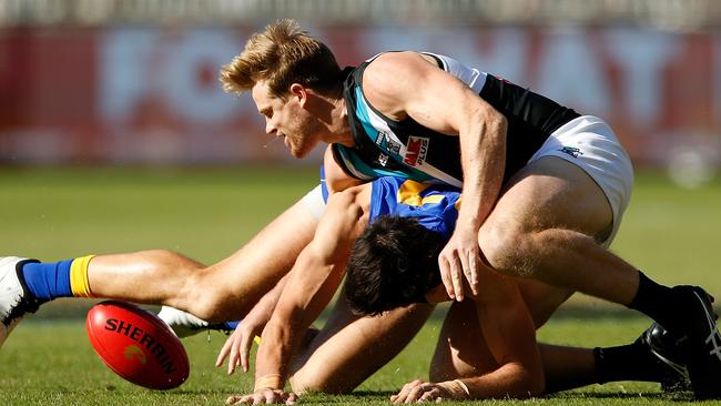 Tom Jonas grapples with West Coast’s Josh Kennedy in Round 7. Picture: Paul Kane/Getty Images