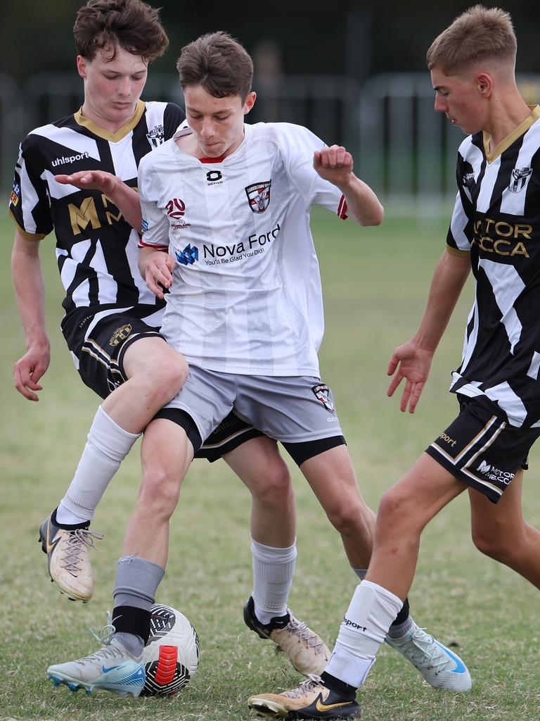 Premier Invitational Football 2024 tournament at Glennon Park Nerang. Field 5...Willowburn (black stripes) V Caboolture. Picture Glenn Hampson