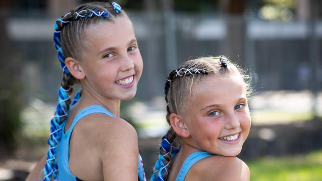 Drew (10) and Bella (9) Cooney from Bowral with their beaded hair. Drew competed in shot put, triple jump, high jump and javelin. Bella competed in 100, 200, 70 sprints and shot put.