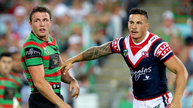 South Sydney's Sam Burgess and Rooster's Sonny Bill Williams during the South Sydney Rabbitohs v Sydney Roosters 2014 season opening game at ANZ Stadium,Homebush .Picture Gregg Porteous