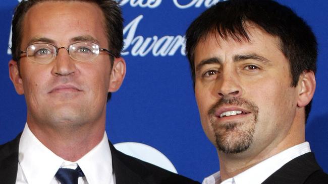 Matthew Perry and Matt LeBlanc pose backstage during the 30th Annual People's Choice Awards at the Pasadena Civic Auditorium January 11, 2004 in Pasadena, California. (Photo by Carlo Allegri/Getty Images)