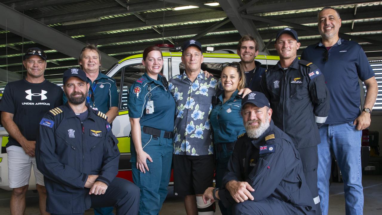 Rick Bettua with the emergency workers who saved his life. Picture: Lachie Millard