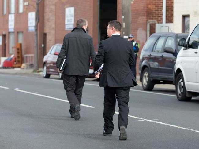 Homicide Squad detectives attend the scene. Picture: Sarah Matray