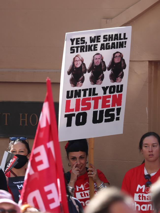 Teachers made creative signs for the protest. Picture: John Grainger