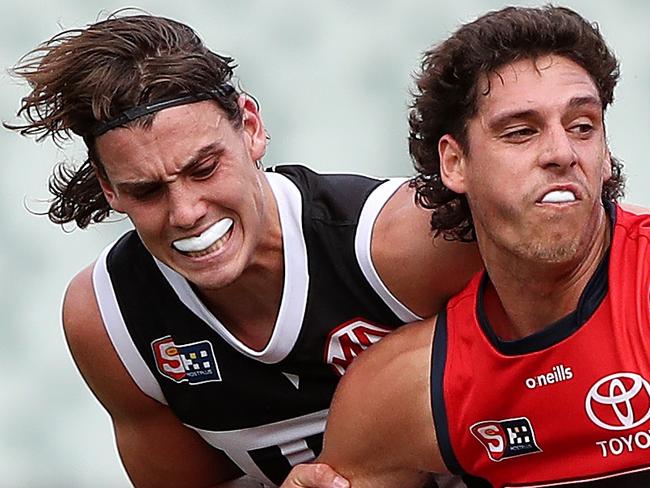 Saturday, 1st April, 2023 - SANFL Showdown. Port Adelaide v Adelaide Crows at the Adelaide Oval. James Borlase of the Adelaide Crows. And Ollie Lord of Port Adelaide Picture: Sarah Reed