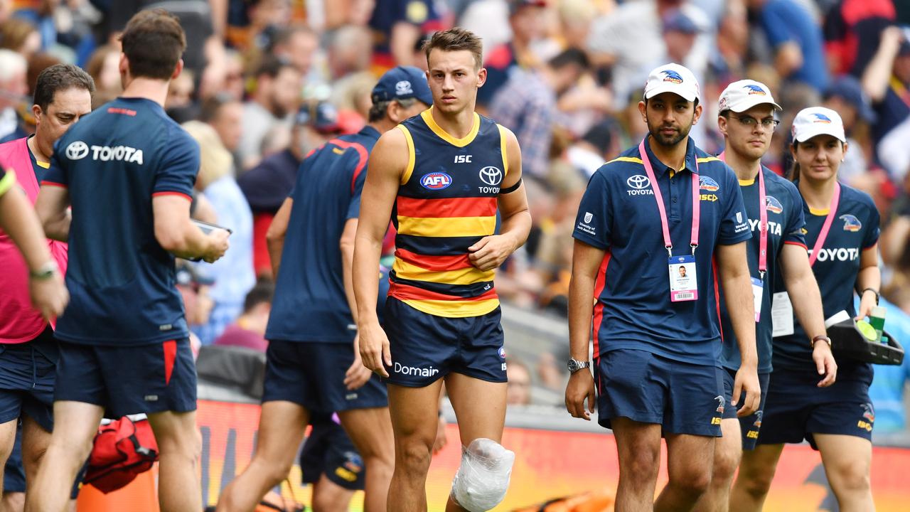 Young Crows defender after rupturing his ACL on Saturday. Picture: AAP Image/David Mariuz