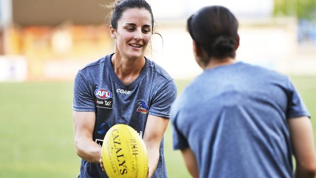 Ange Foley trains with her Northern Territory-based Adelaide teammates at TIO Stadium on Monday night.