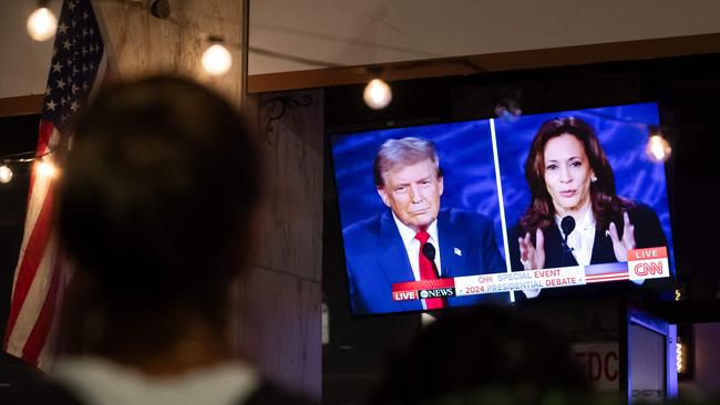 A bar screen showing the debate in Washington, DC, on September 10, 2024. (Photo by Allison Bailey / AFP)