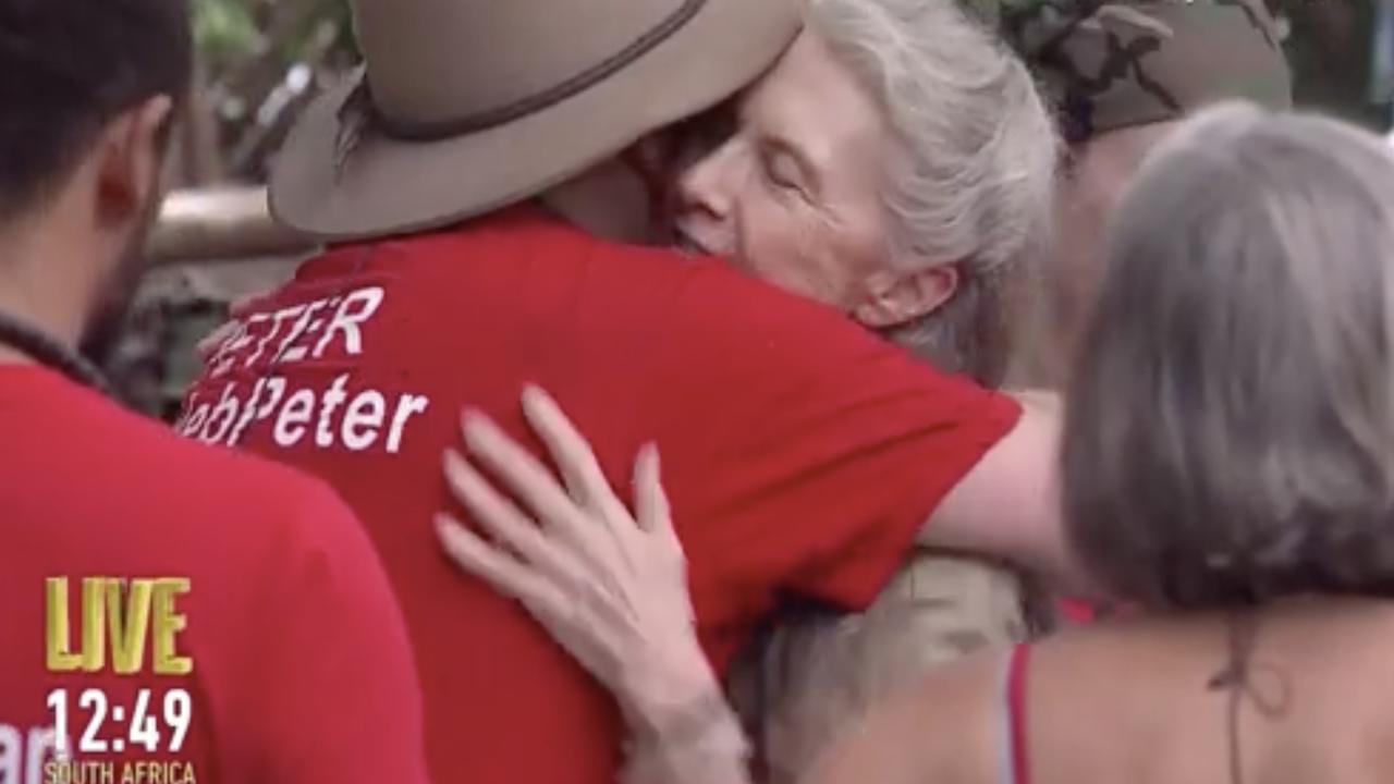 Peter Helliar gave her a big hug as she left the camp.