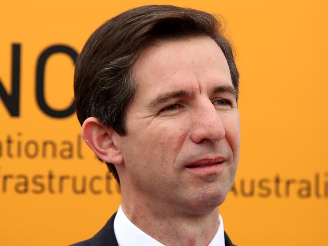 Federal Minister for Education and Training Simon Birmingham is seen during a press conference with Federal Minister for Jobs and Innovation Michaelia Cash, Australian Chief Scientist Alan Finkel and Federal Member for Boothby Nicole Flint during a tour of the Waite Campus of the Adelaide University in Adelaide, Tuesday, May 15, 2018. Institutions researching cancer, cyber security and management of the Great Barrier Reef will benefit from $1.9 billion in federal government infrastructure funding. Education Minister Simon Birmingham says the Research Investment Strategy responds to recommendations made by scientists, including Australia?s Chief Scientist Alan Finkel. (AAP Image/Kelly Barnes) NO ARCHIVING