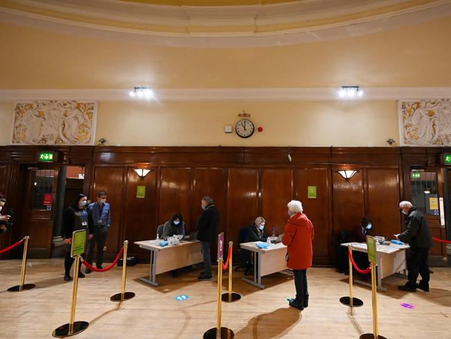 Members of the public wait to receive a dose of the AstraZeneca/Oxford COVID-19 vaccine in northeast England. Picture: AFP.