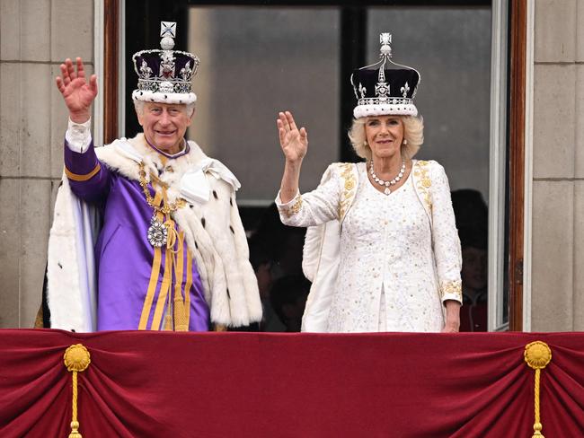 King Charles III wearing the Imperial state Crown, and Queen Camilla wearing a modified version of Queen Mary's Crown after their coronations. Picture: AFP