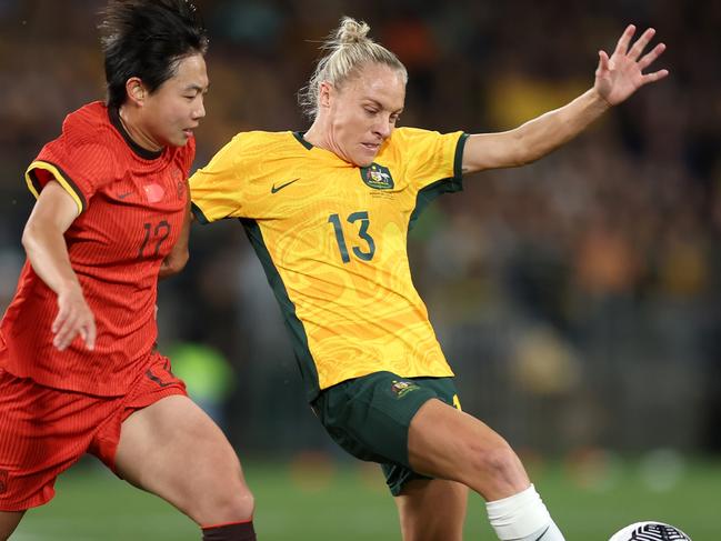 SYDNEY, AUSTRALIA - JUNE 03: Tameka Yallop of Australia is challenged by Wu Chengshu of China PR during the international friendly match between Australia Matildas and China PR at Accor Stadium on June 03, 2024 in Sydney, Australia. (Photo by Matt King/Getty Images)