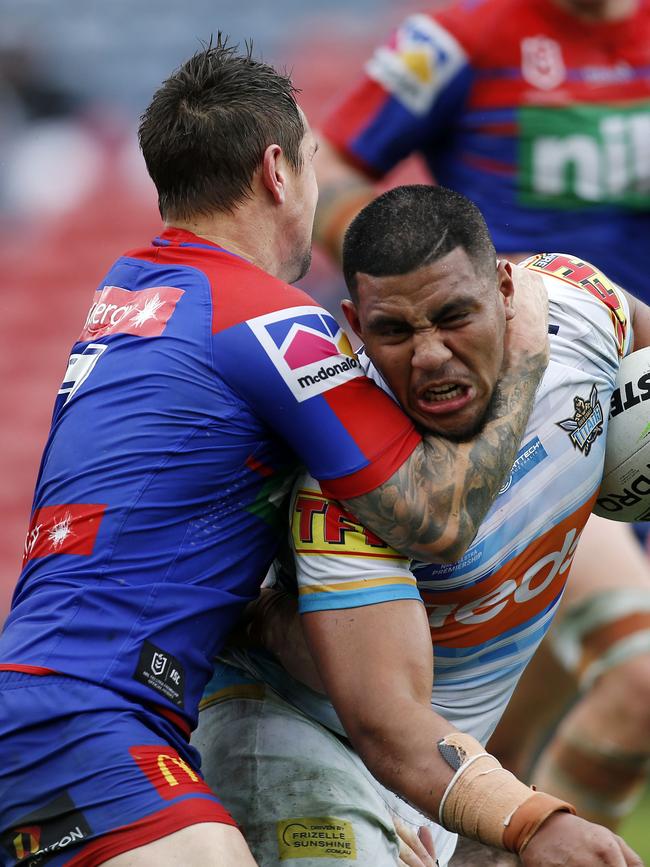 Moeaki Fotuaika is collected high. Picture: AAP/Darren Pateman