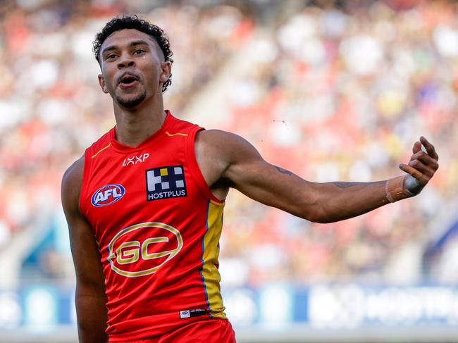 GOLD COAST, AUSTRALIA - MARCH 09: Malcolm Rosas of the Suns celebrates a goal during the 2024 AFL Opening Round match between the Gold Coast SUNS and the Richmond Tigers at People First Stadium on March 09, 2024 in Gold Coast, Australia. (Photo by Russell Freeman/AFL Photos via Getty Images)