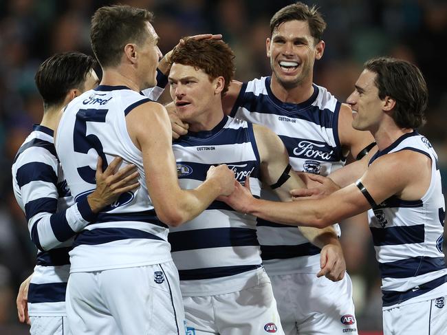 ADELAIDE, AUSTRALIA - JUNE 15: Gary Rohan of the Cats celebrates a goal with team mates during the 2023 AFL Round 14 match between the Port Adelaide Power and the Geelong Cats at Adelaide Oval on June 15, 2023 in Adelaide, Australia. (Photo by Sarah Reed/AFL Photos via Getty Images)