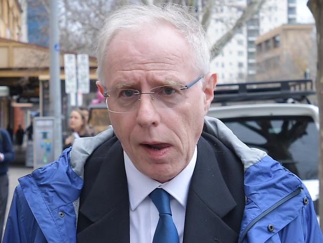 Dr Jim Buckley from The Royal Adelaide Hospital departs after giving evidence at the inquest into the deaths of stroke victims Michael John Russell and Leslie Robert Graham at the Coroner's Court in Adelaide, Wednesday, Aug. 2, 2017. South Australian coroner Mark Johns is investigating the deaths of 60-year-old Michael John Russell and 87-year-old Leslie Robert Graham, who both died after suffering strokes at the Royal Adelaide Hospital. (AAP Image/David Mariuz) NO ARCHIVING