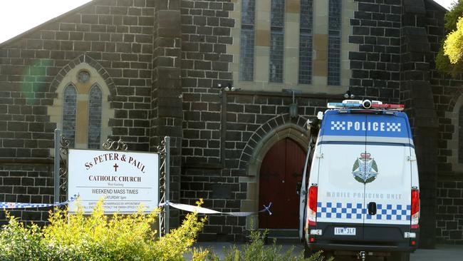 Police at the scene on Malone St in Geelong near the St Peter and Paul Catholic Church on Friday morning. Picture: Alison Wynd