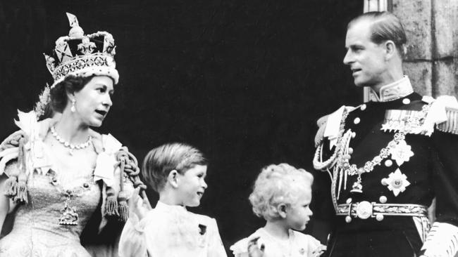 Prince Charles and Princess Anne with their parents after Queen Elizabeth’s coronation in 1953.