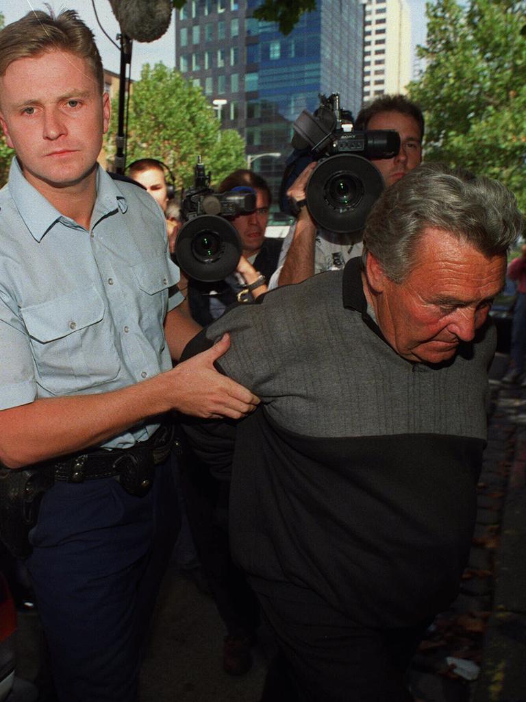 Aubrey Broughill being led into court in 1997.