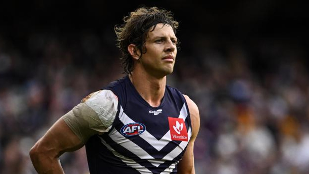 PERTH, AUSTRALIA - JUNE 11: Nat Fyfe of the Dockers sets for a kick on goal during the 2022 AFL Round 13 match between the Fremantle Dockers and the Hawthorn Hawks at Optus Stadium on June 11, 2022 in Perth, Australia. (Photo by Daniel Carson/AFL Photos via Getty Images)