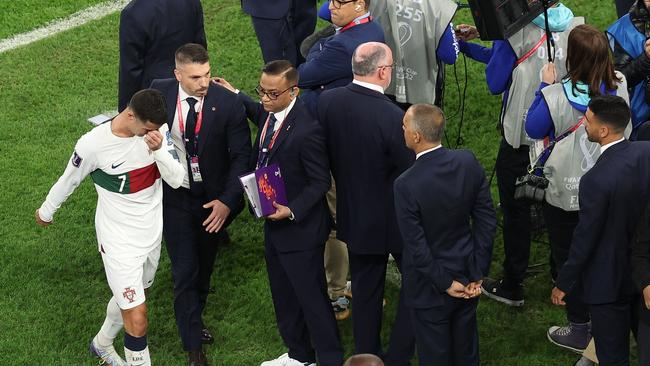 The Portuguese star walks off after possibly his final World Cup game. (Photo by Alexander Hassenstein/Getty Images)