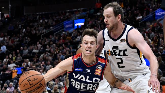 Nathan Sobey of the Adelaide 36ers drives around Joe Ingles of the Utah Jazz in the first half of a pre-season NBA game at Vivint Smart Home Arena on October 5, 2018 in Salt Lake City, Utah. Picture: AFP