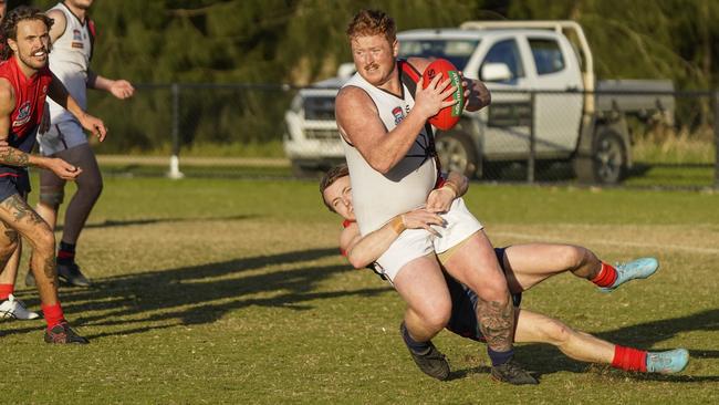 SFNL: Hampton Park’s Jye King can’t escape the tackle. Picture: Valeriu Campan