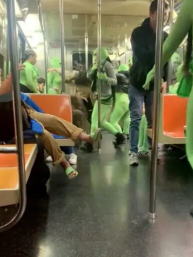 Two of the female assailants were dressed head to toe in neon green suits. Picture: Reddit/RoBoyJones