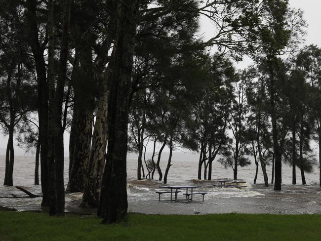 Battle to keep south coast town open as storms rage