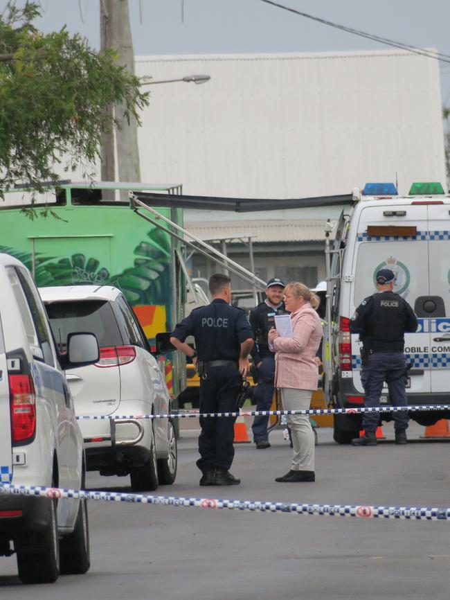 Forensic police on the scene of the fatal shooting at Queen St, Stockton, on June 9, 2021. Picture: Emily Burley.