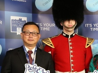 Yang Tengbo with a Grenadier Guard and an unidentified woman at a Pitch@Palace event