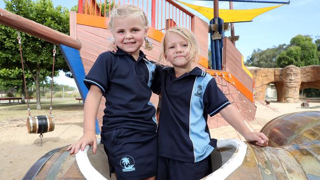 First day of school. Sarah Miglioranza, 5, and Archie Williamson, 5, at the Pirate Park, Palm Beach. Picture: Richard Gosling