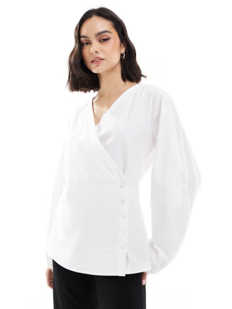 ASOS DESIGN poplin wrap placket cocoon sleeve shirt in white. Picture: ASOS.