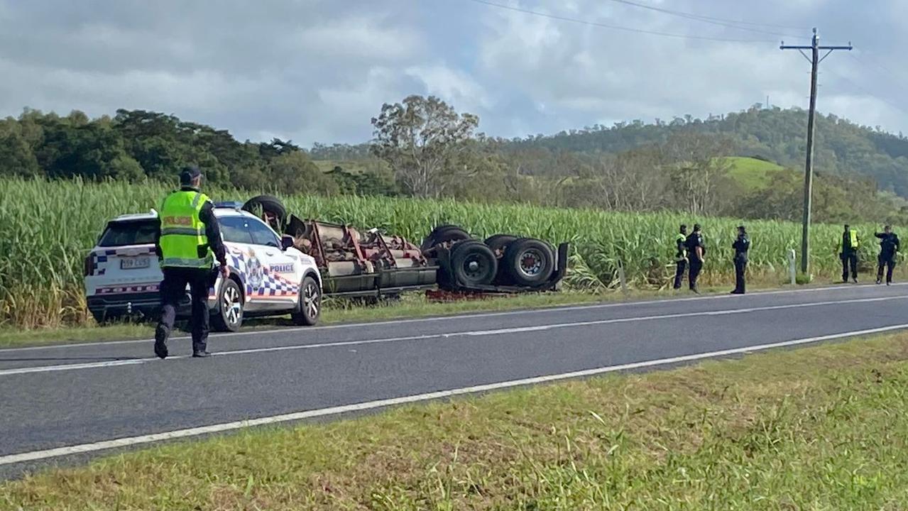 A truck driver was pinned inside a crushed truck cabin after it rolled into a cane paddock near Oakenden on Eton Homebush Rd, February 18. Picture: Matthew Forrest